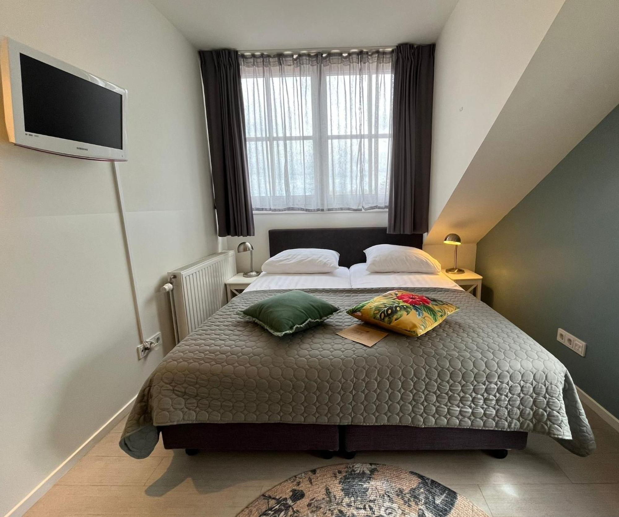 Bed & Brasserie Het Kosthuys Sint-Maartensdijk Bagian luar foto
